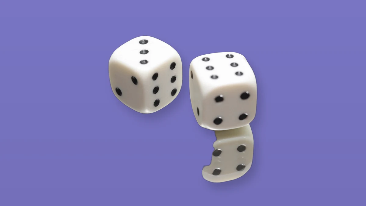 White dice isolated on a lavender background to symbolize risk decisions