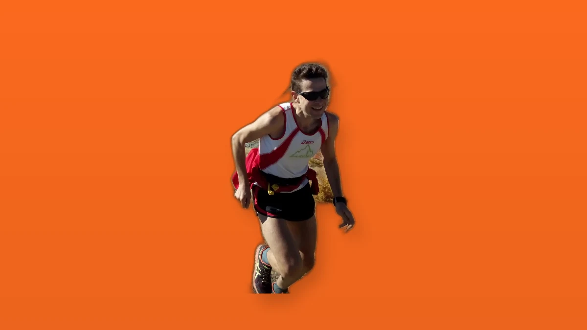 Photo illustration of a trail runner pushing uphill representing effort and willpower