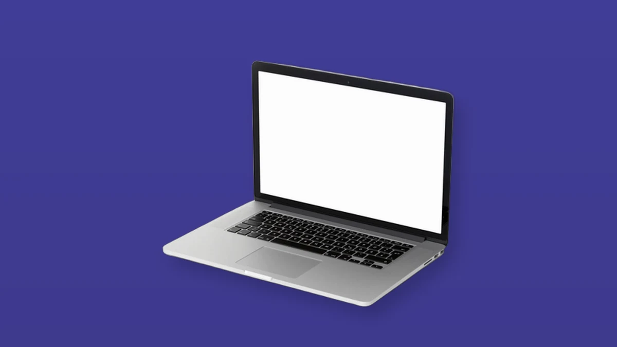 Photo illustration of an open silver laptop on a violet background