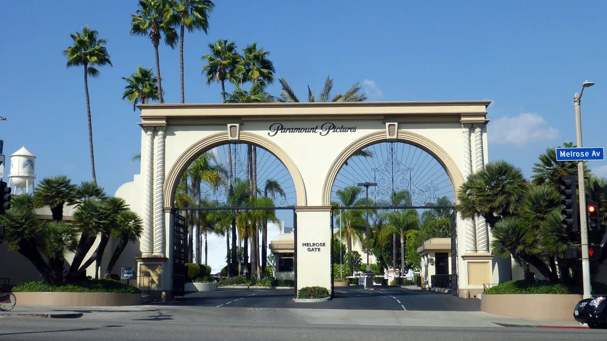 The Paramount Pictures Melrose Gate in Los Angeles with the studio water tower behind it