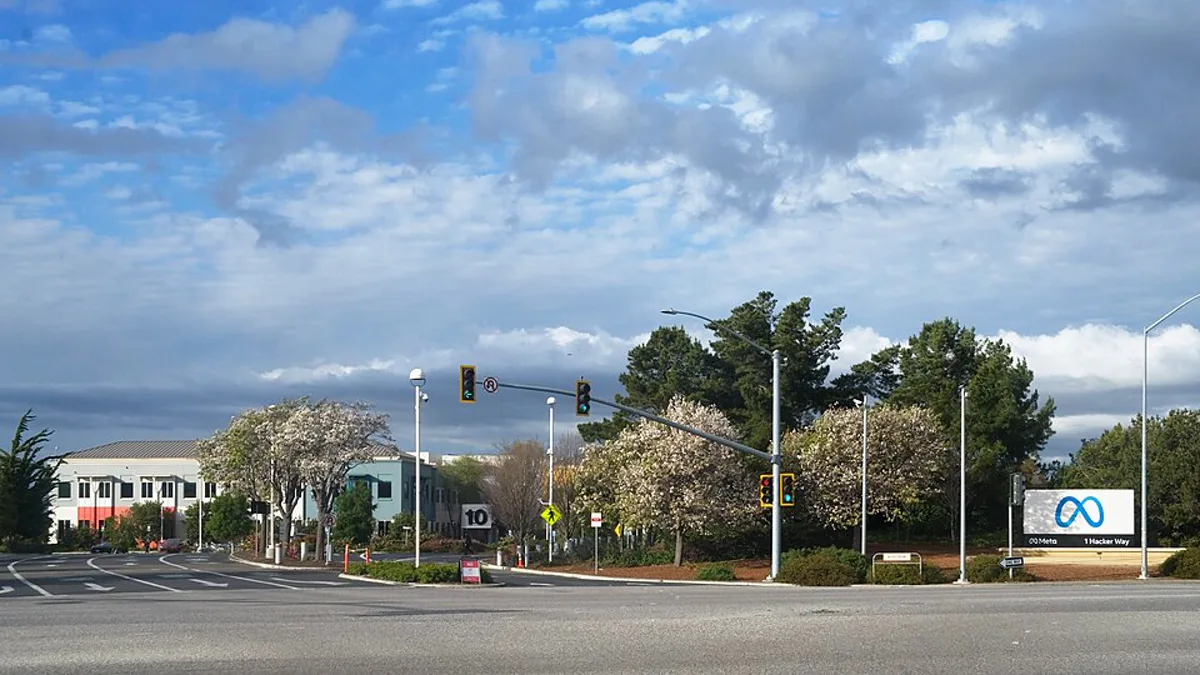 The Meta Platforms sign at the company's headquarters entrance at 1 Hacker Way in Menlo Park, California