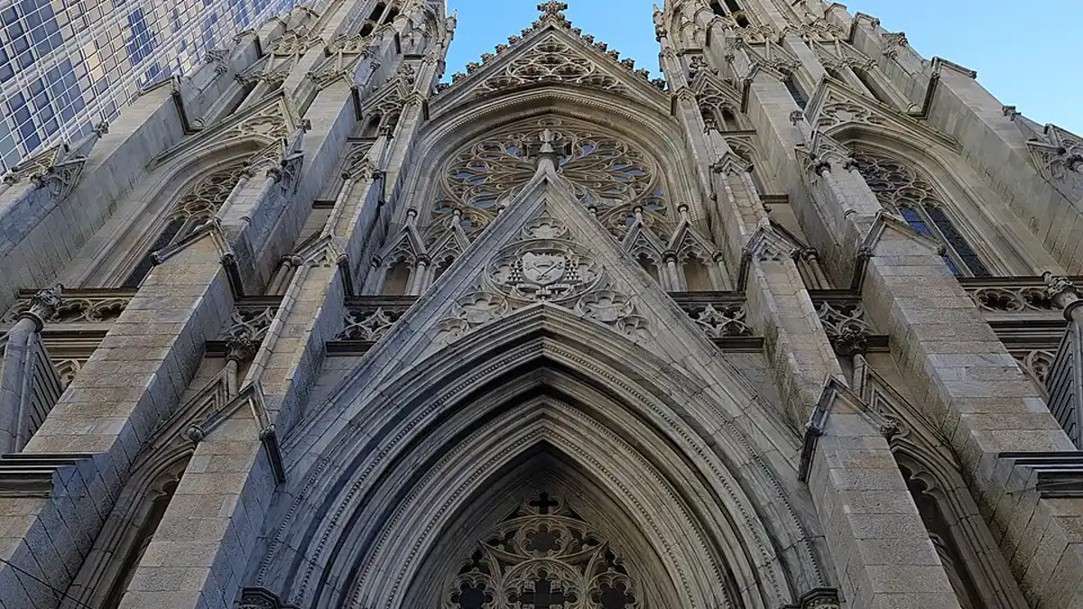 The Gothic facade and twin spires of St. Patrick's Cathedral in Manhattan seen from below