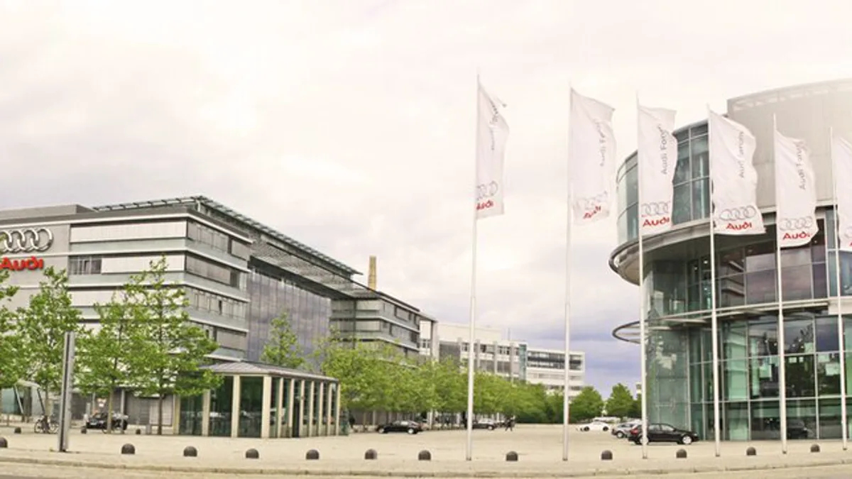 Audi four-ring logos on buildings and flags at the Audi site in Ingolstadt
